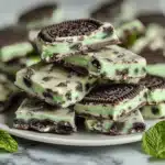 This Mint Oreo Bark is a no-bake treat packed with white chocolate and crunchy cookies! Ready in minutes and perfect for gifting.