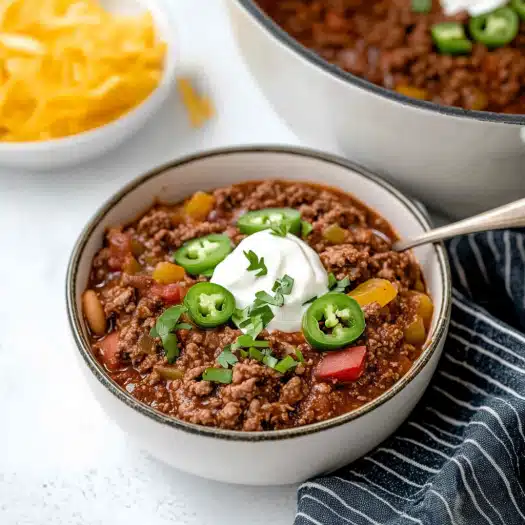 Make Keto Low Carb Beef Chili in the Instant Pot or Crock Pot. Hearty, flavorful, and bean-free, this recipe is perfect for a low-carb lifestyle.